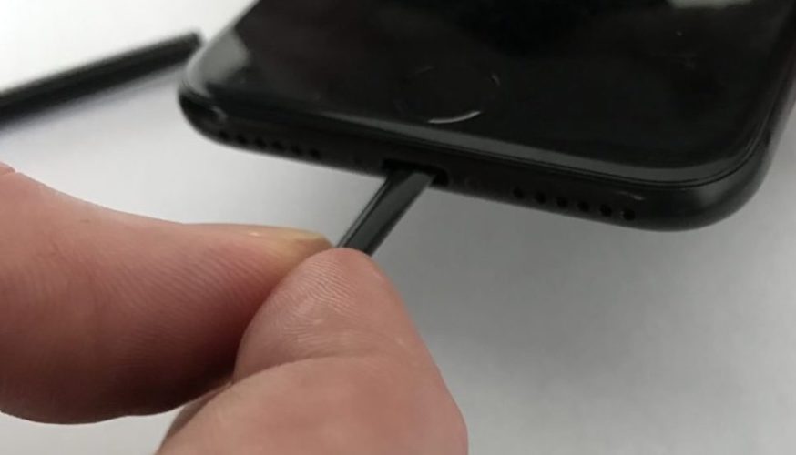 clean iphone lightning port with cocktail straw