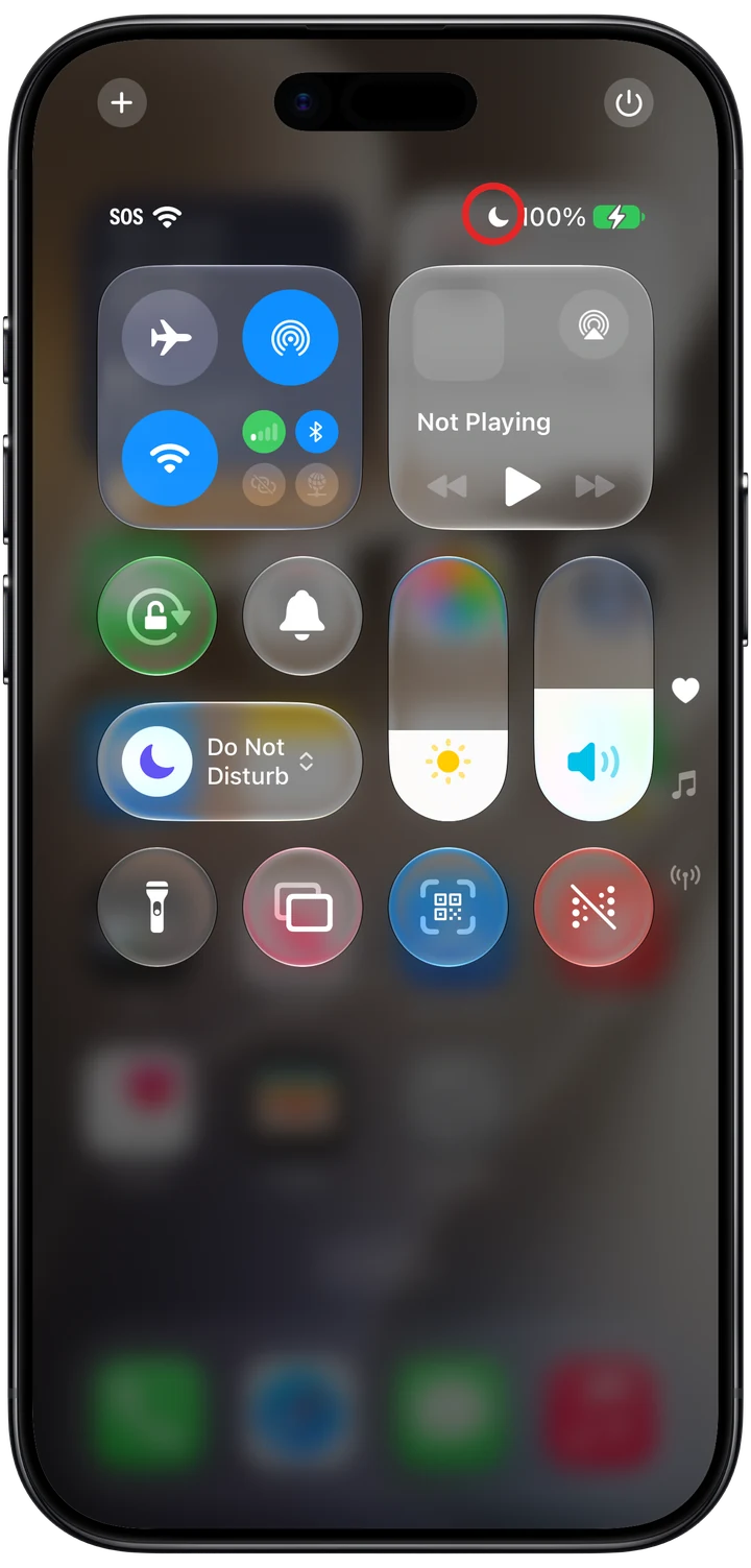 Control Center with Do Not Disturb on, shown by the moon icon marked in red in the status bar